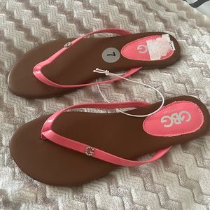 Pink thong sandals. Never worn, only took off the sticker for the price.